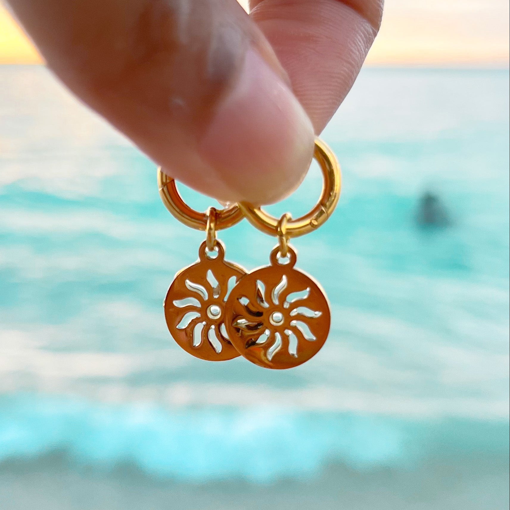 Sun golden earrings